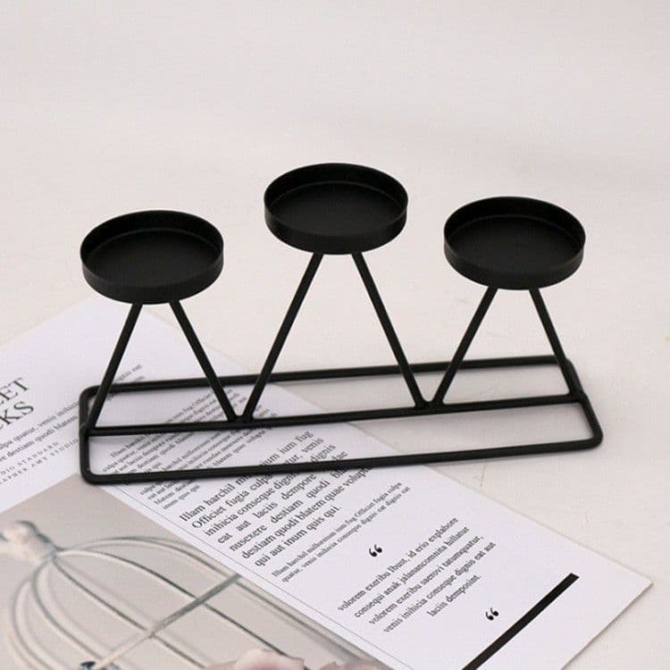 Black three-place metal candle holder