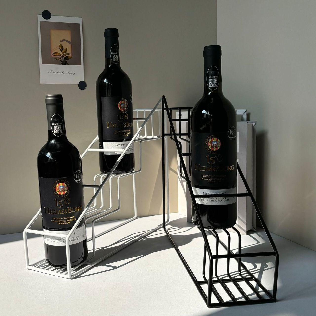 Stepped metal bottle display rack
